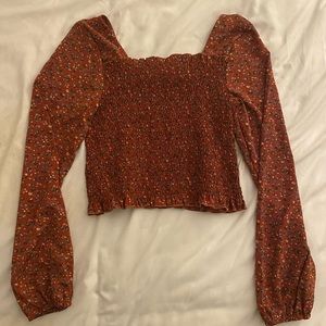 Smocked burgundy floral blouse